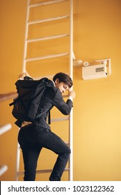 Dont Play Truant. High School Student Climbing Up The Ladder While Skipping Classes