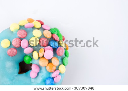 Similar – Dot on chocolate Candy