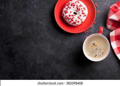 Donut And Coffee On Stone Table. Top View With Copy Space