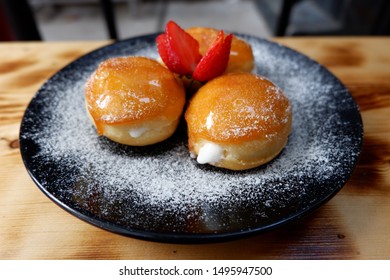 Donut creme brulee
donut creme brulee, bread filled with milk creme and caramel on the surface of the bread - Powered by Shutterstock