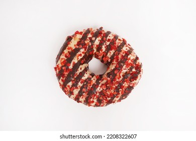 Donut with pink sprinkles and chocolate isolated on white background. Top view - Shutterstock ID 2208322607