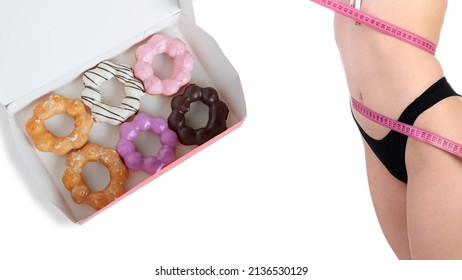 Donuts With Assorted Colorful In A Box, Snack, Dessert High Calorie And Trans Fats, Women Measuring Waist Circumference, Isolated On White Background With Copy Space, Healthy And Health Care Concept.