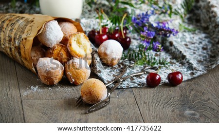 donuts balls, castagnoles italian with powdered sugar