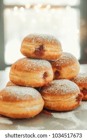 Donuts with jelly and sugar powder
