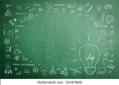 Doodle freehand white chalk drawing green chalkboard and idea light bulb   blank copy space