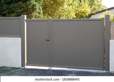 door aluminum grey brown gate portal of suburb house