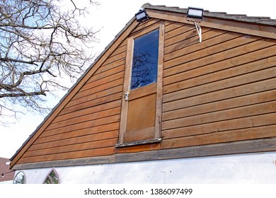 A Door From The Attic Area Of A Barn Leads Out Into Open Space. Potentially Very Dangerous.