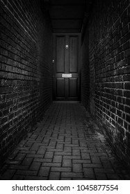 Door At The End Of A Dark Alleyway At Night