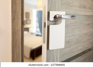 A door handle with blank paper hanger