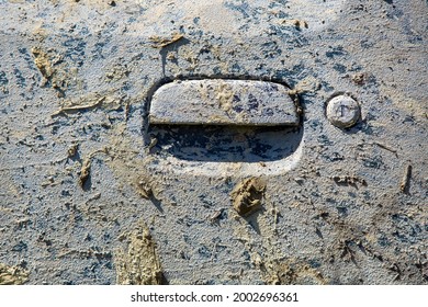 A Door Handle With A Keyhole Of A Car Covered With A Layer Of Mud From A Dried Bog To The Body Of An SUV A Close-up Texture, Nobody.