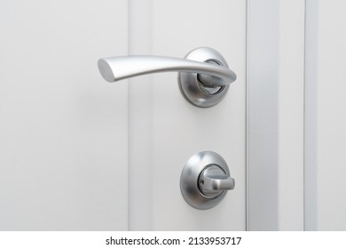 Door Handle With Lock On White Wooden Interior Door. Personal Space Concept.