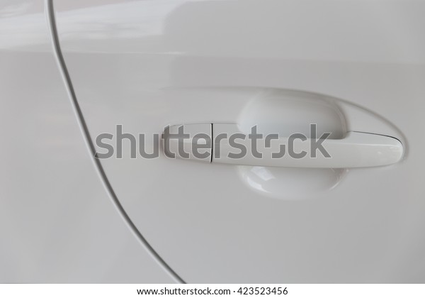 door handle of new white
car