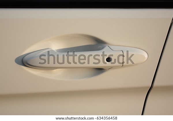 Door\
handle with push button lock.Techonlogy of\
car