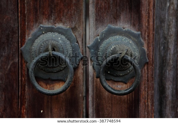 Door Handles Made Steel On Wooden Stock Photo Edit Now 387748594