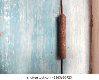 the door hinges are rusty and old
