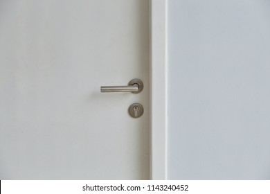 Door Knob Or Handle On White Door. Selective. Close Up.