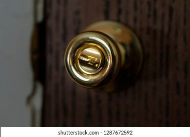 Door Knob Illuminated In Dark Room, Gold Doorknob At Night 