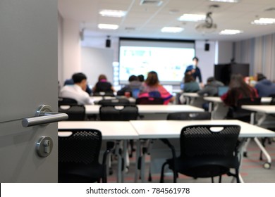 Door With Knob Opening To A Classroom