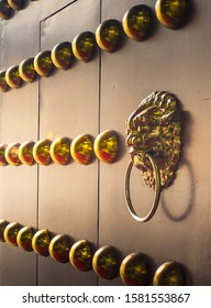 Door Knocker In The Shape Of Golden Lion  And Golden Ball In Taiwan