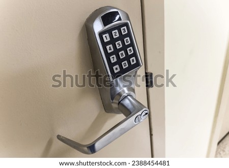 door lock, embodying security and access control. The polished metal and intricate design convey a sense of modern protection for homes and businesses