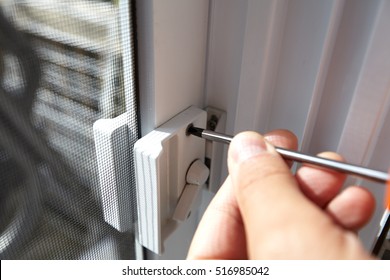 Door lock installation. - Powered by Shutterstock