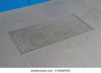 Door Mat Doormat Galvanized Steel Metal Cubic Grating Grid Grill For Cleaning Shoes, Mud Removal, Boot Scraper, By A Building House Entrance, Surrounded By Ceramic Tiles