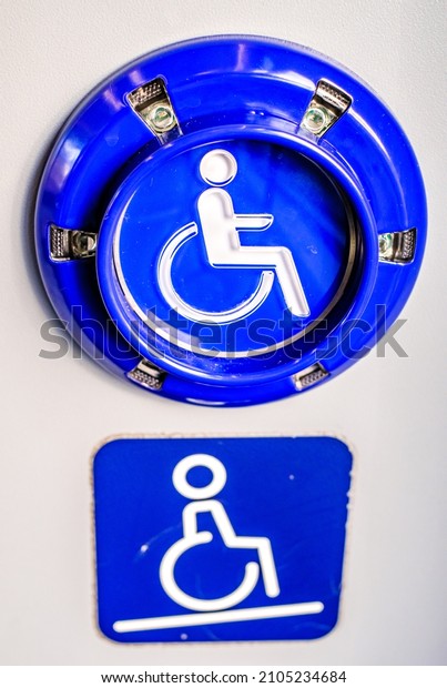 door opening button\
for disabled people