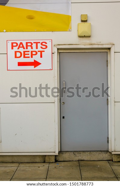 Door of a parts\
department at a car\
showroom