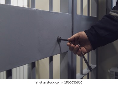The door of a prison or detention center. Background - Shutterstock ID 1966635856