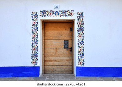 Door to a traditional folk building called 