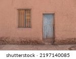 Door and window in adobe house in San Pedro de Atacama, Chile