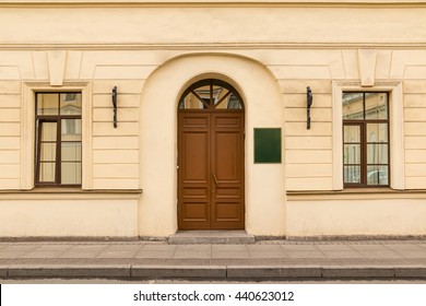 Door And Windows On Facade Of Urban Office Building Front View, St. Petersburg, Russia
