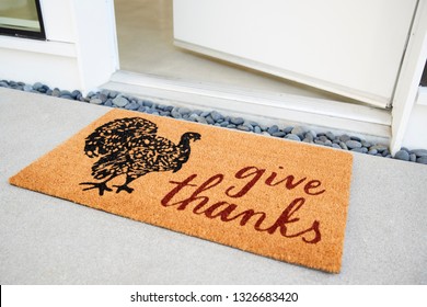 Doormat Outside Open Front Door Of House