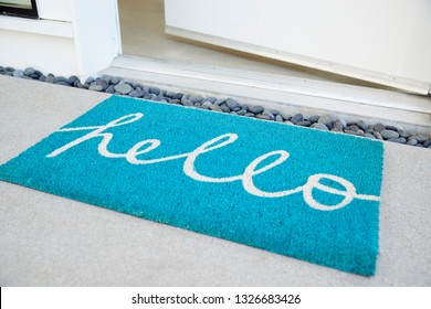 Doormat Outside Open Front Door Of House