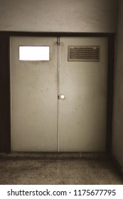 The Doors With Broken And Old Window Shade In Abandoned Building