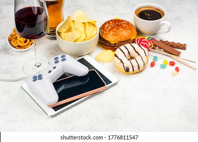 Dopamine Fasting Background. Life Without Social Media, Gadget And Food Detox Concept. Red And White Signal Ribbon Covering Junk Food And Digital Devices. Copy Space