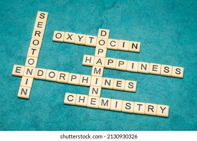 Dopamine, Oxytocin, Serotonin And Endorphins, Happiness Brain Chemicals, Chemistry And Physiology Concept, Crossword In Ivory Tiles Against Textured Handmade Paper