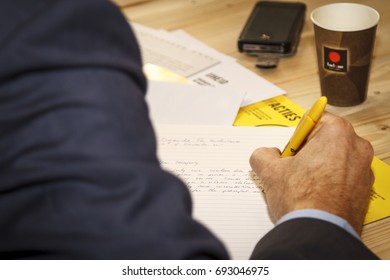 DORDRECHT, NETHERLANDS - DECEMBER 10, 2015: Man Writing Letter During A Letter-writing Campaign Organized By Amnesty International. Write For Rights Is Amnesty Most Successful Letter-writing Campaign.