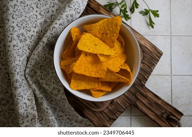 Doritos in a plate on an old background