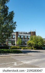 Dorking, Surrey Hills, London UK, August 13 2022, Low Rise Commercial Office Block Or Development With Blue Sky And No People