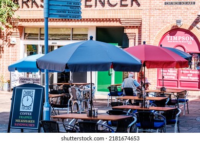 Dorking Surrey Hills UK, July 10 2022, Couple Sitting Outside Marks And Spencer In Outdoor Coffee Shop Relaxing And Talking