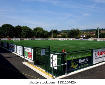 Dorking, Surrey, UK- JULY 6 2018: The New Dorking Wanderers Football Stadium, Showing The Astro Turfed Pitch With Surrounding Sponsor Banners.
