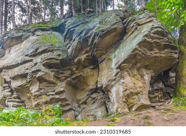Dorkowa Skała - a boulder (rocky outcrop) located on the red tourist trail near Szarcula in the southern part of the Silesian Beskids (Poland).
