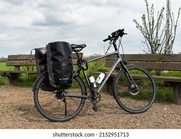 Dormaal, Flemish Brabant, Belgium - 04 05 2022- Trekking Bike Standing  In The Fields Of The Flemish Countryside