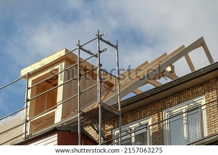 dormer installation on the rooftop of a apartment house Foto stock © 