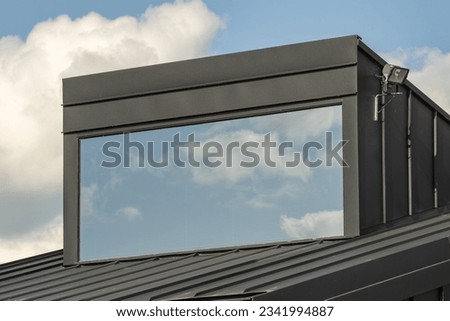 Dormer window in a family home with a wide panoramic window ストックフォト © 