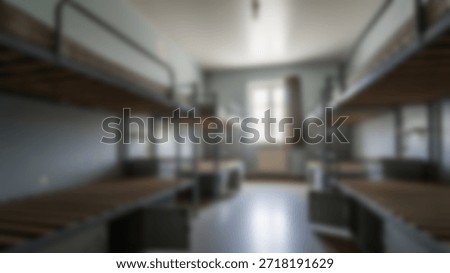 Dormitory room with multiple bunk beds with shared sleeping quarters, and basic accommodation.