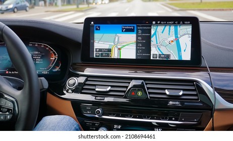 Dortmund, Germany - December 28, 2021: Technology In Car With GPS Navigator For Combine With Interior Design In Luxury Car