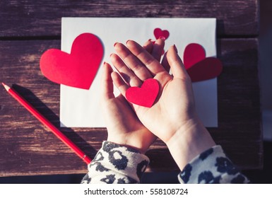 Dos Cors Royalty Free Background Template.Girl Holding Red Paper Hearts For Saint Valentines Day.Hand Made Love Letter For Lover On 14 February.Curated Collection Of Love Images And Photos