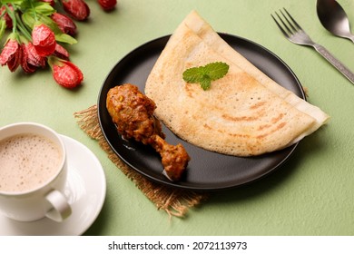 Dosa , Dosai, Ghee Roast With Chicken Curry Popular South Indian Breakfast Food, Kerala, Tamil Nadu India Sri Lanka. Masala Dosa With Non Vegetarian Indian Kadai Chicken Leg Curry.